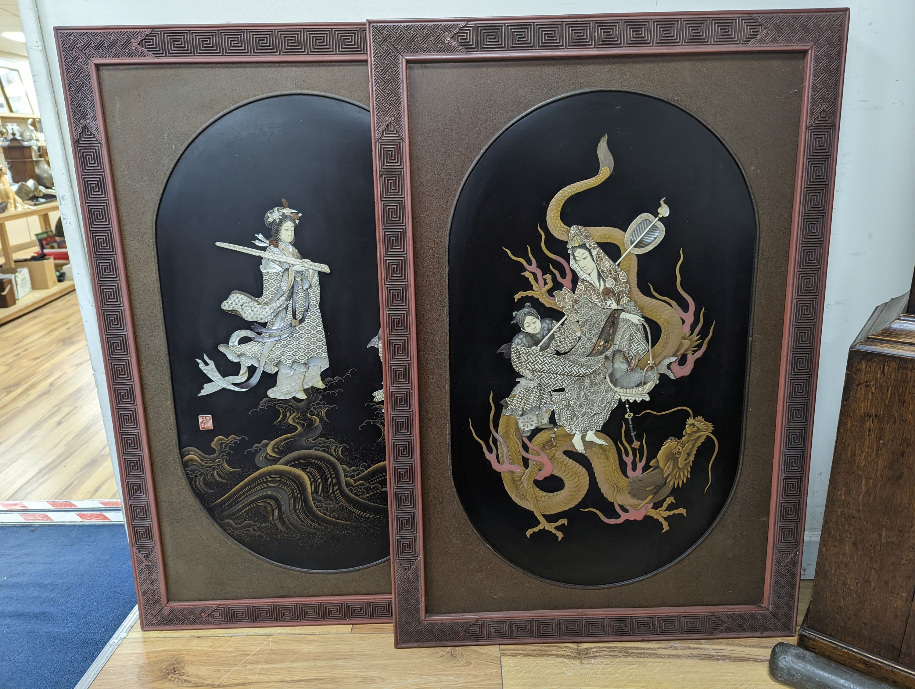 A pair of Japanese Shibayama panels, Meiji period, with cinnabar lacquer frames